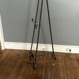 Metal Easel  With Five Adjustable Settings For Picture Or Water Ever You Chose To Use It For . And Can Always Spray Paint It To Your Liking.
