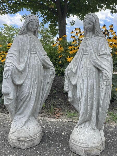 A set of two concrete blessed Virgin Mary statues
