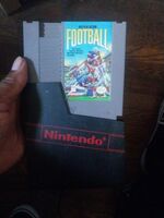 Nintendo plays action football game.